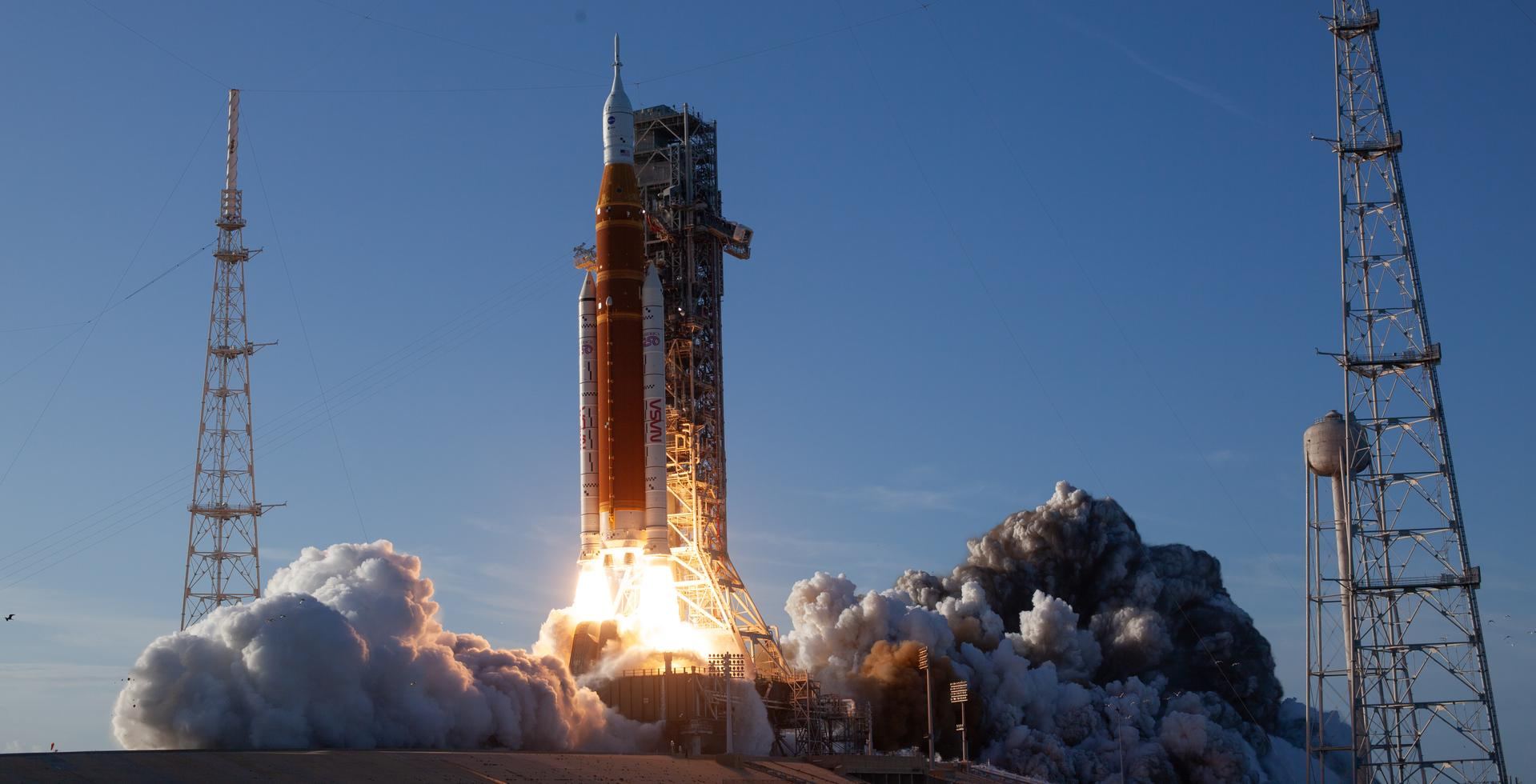 The SLS rocket lifting off from Launch Complex 39B at Kennedy Space Center
